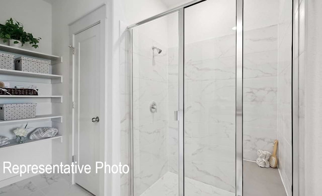 bathroom with an enclosed shower