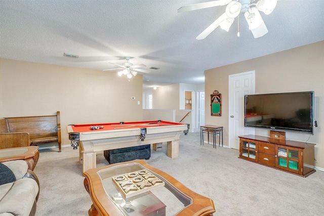 playroom featuring ceiling fan, light colored carpet, a textured ceiling, and pool table