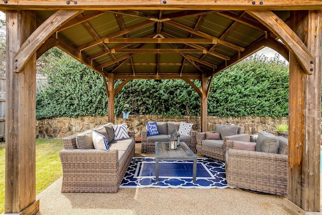 view of patio featuring a gazebo and an outdoor living space