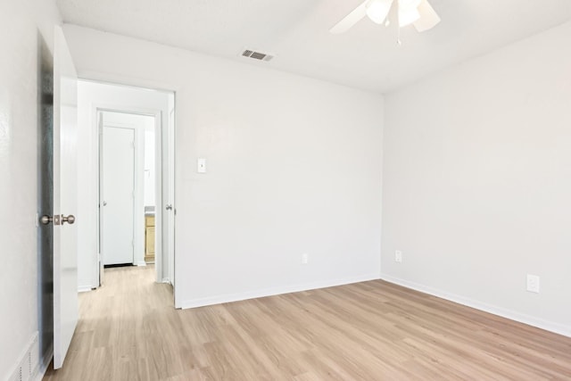 spare room with ceiling fan and light hardwood / wood-style floors