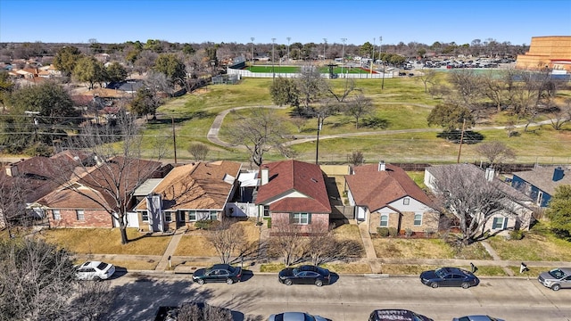 birds eye view of property with a residential view