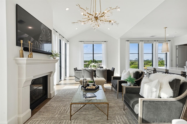 living room with hardwood / wood-style floors and lofted ceiling