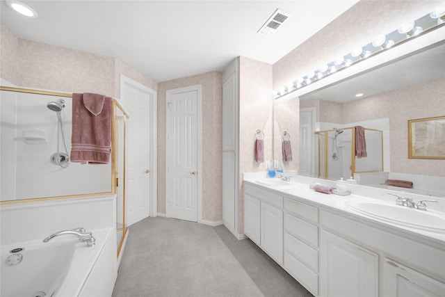 bathroom featuring vanity and plus walk in shower