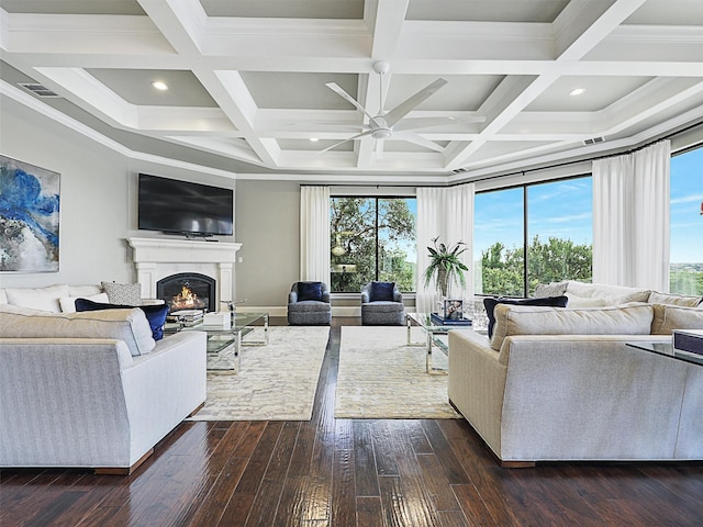 living room with ceiling fan, crown molding, beam ceiling, and coffered ceiling