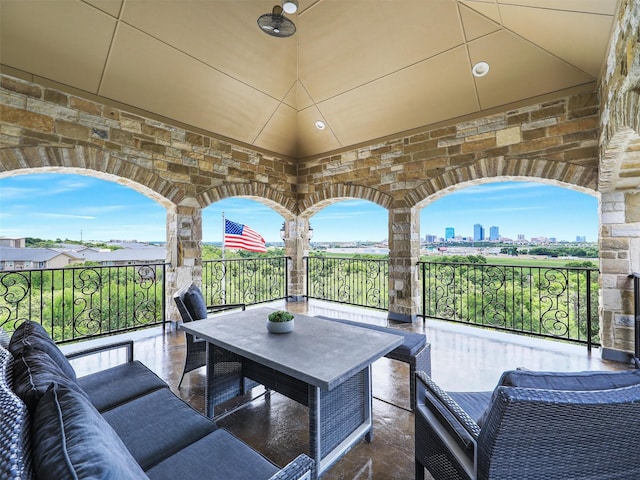 view of patio / terrace featuring an outdoor living space and a balcony