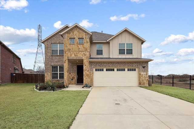 view of front of property featuring a garage and a front yard