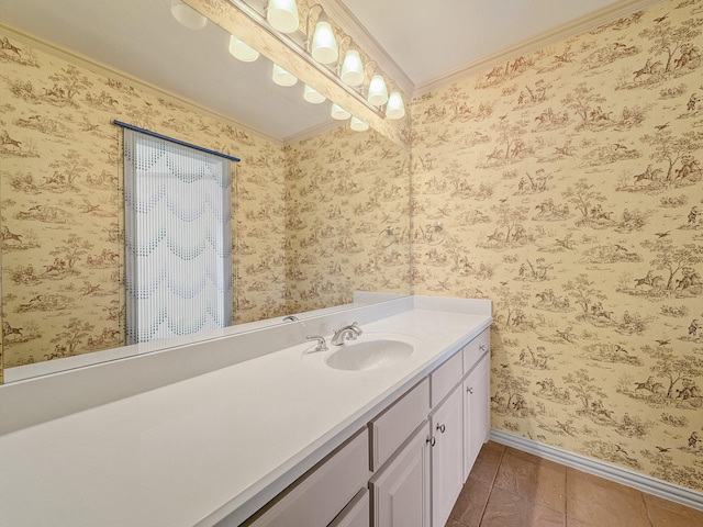 bathroom featuring vanity, tile patterned flooring, and crown molding