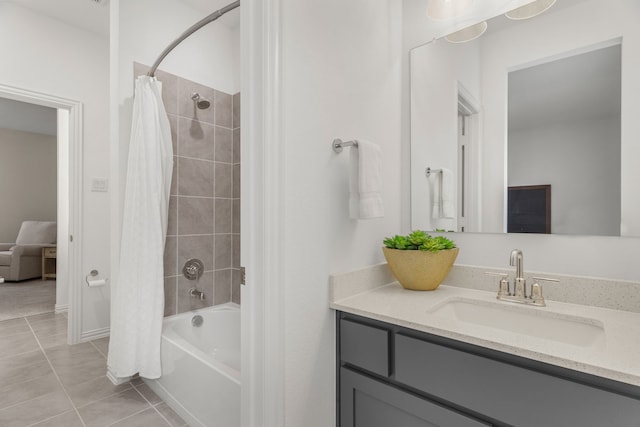 bathroom featuring vanity, tile patterned flooring, and shower / bath combination with curtain