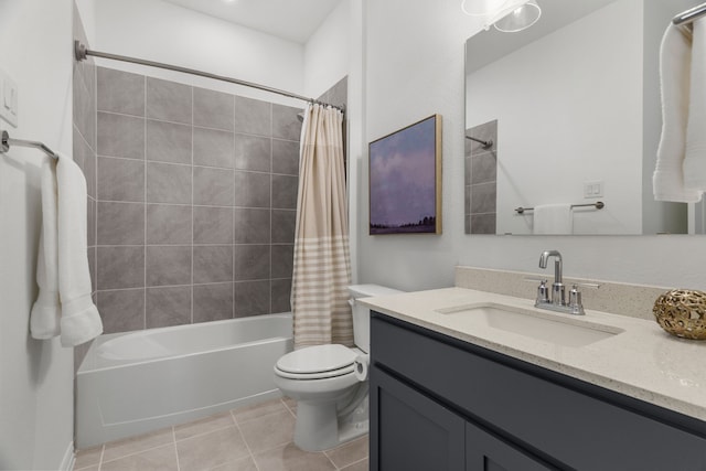 full bathroom featuring toilet, vanity, tile patterned flooring, and shower / bathtub combination with curtain