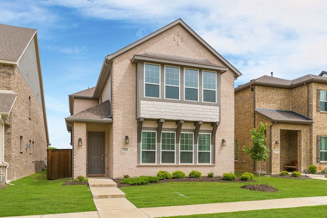 view of front of property with a front lawn