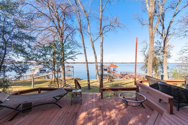 wooden terrace with a water view