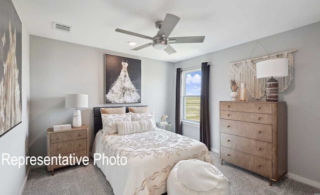 bedroom with ceiling fan and carpet flooring