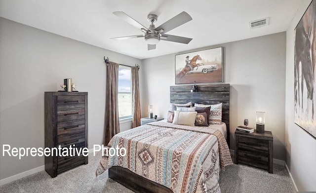 carpeted bedroom featuring ceiling fan