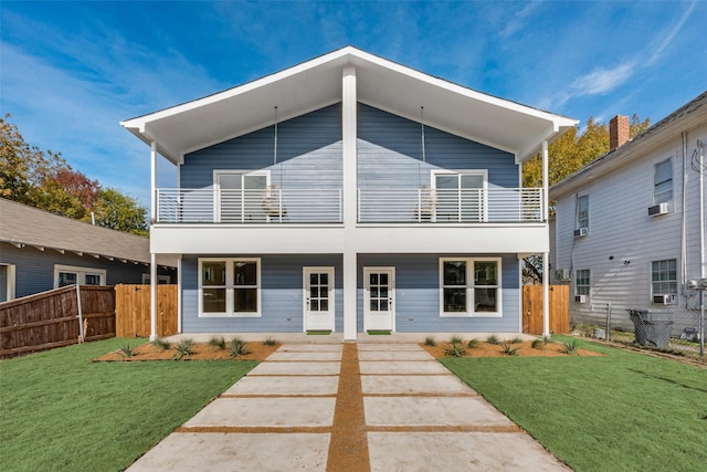 623 Melba St, Dallas, TX 75208 - contemporary house featuring cooling unit, a balcony, and a front yard