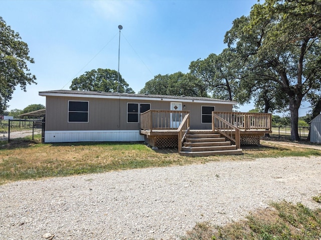 view of front of property with a deck