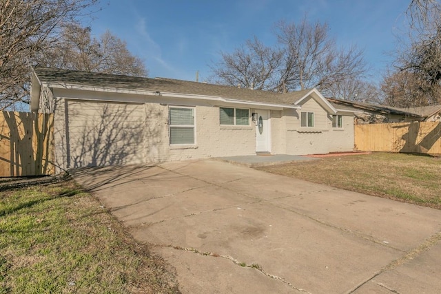 ranch-style house with a front yard