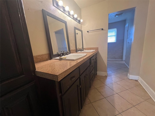 bathroom featuring vanity and tile patterned flooring