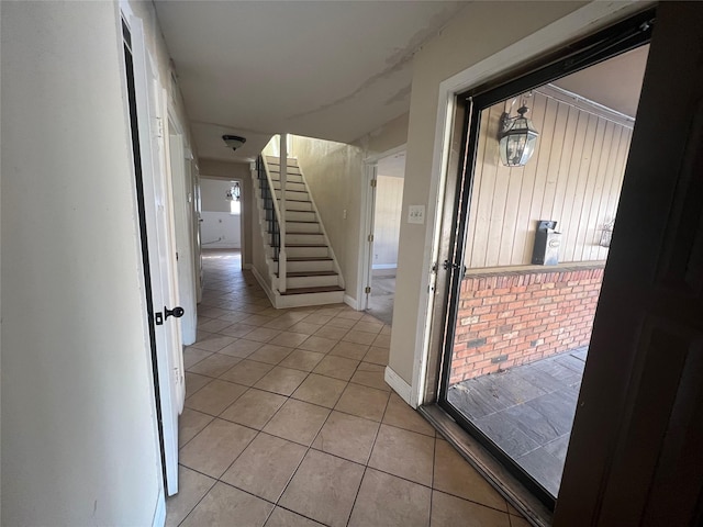 hallway with light tile patterned floors