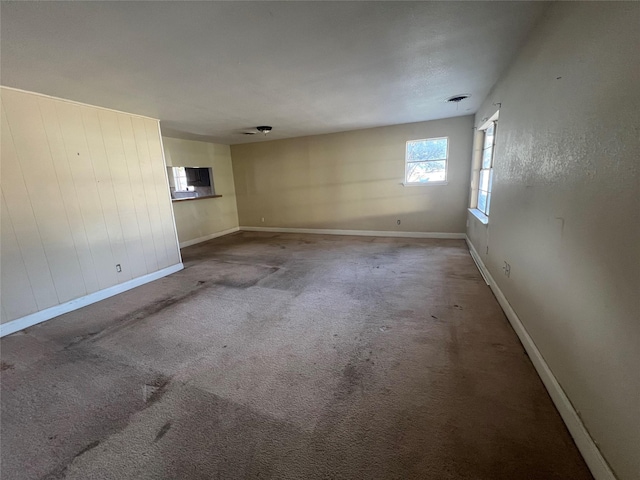 unfurnished room with carpet