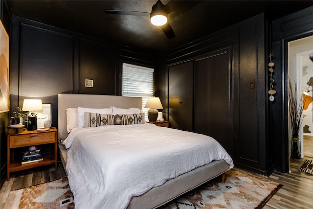 bedroom featuring ceiling fan and light wood-type flooring