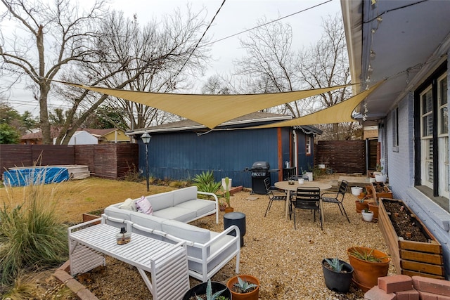 view of patio featuring grilling area and an outdoor hangout area