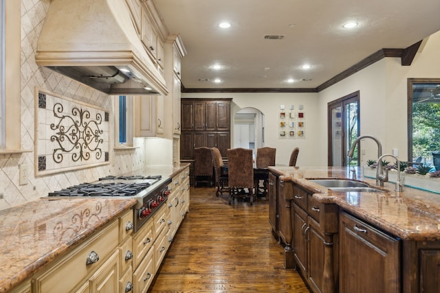 kitchen with custom exhaust hood, backsplash, dark hardwood / wood-style floors, and sink