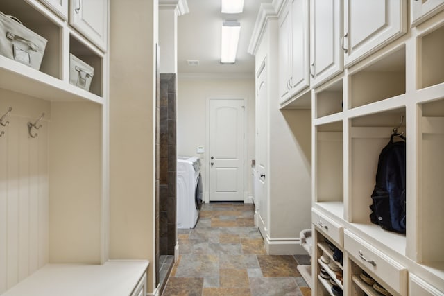 mudroom featuring independent washer and dryer and ornamental molding