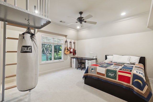 carpeted bedroom with ceiling fan and ornamental molding