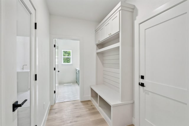 mudroom with light wood-type flooring