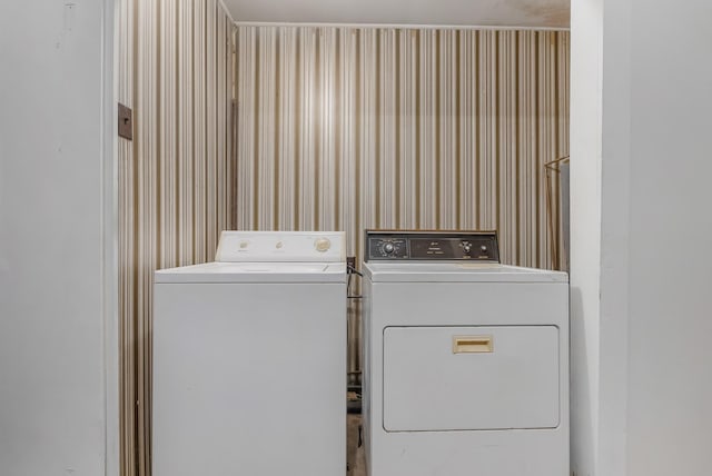 washroom featuring independent washer and dryer