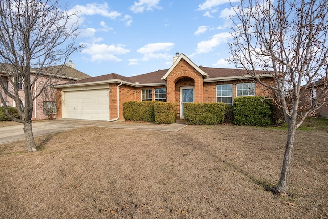 ranch-style house featuring a front lawn and a garage