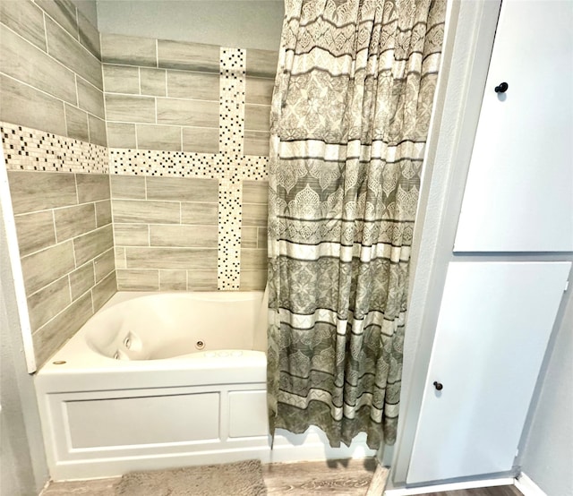 bathroom featuring shower / tub combo with curtain