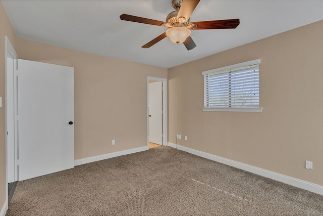 unfurnished bedroom with ceiling fan and carpet flooring