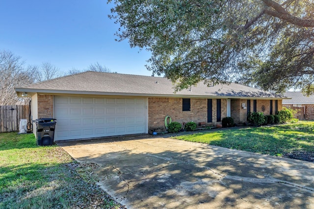 ranch-style home with a front lawn and a garage