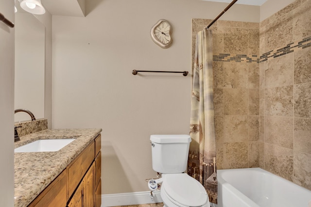 full bathroom featuring toilet, vanity, and shower / bath combination with curtain