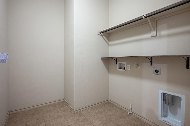 washroom featuring gas dryer hookup, electric dryer hookup, and hookup for a washing machine