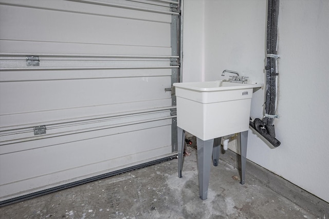 interior space with sink and concrete flooring