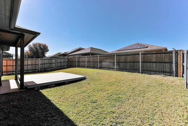 view of yard featuring a wooden deck