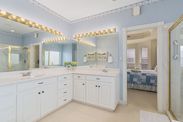 bathroom featuring walk in shower and vanity