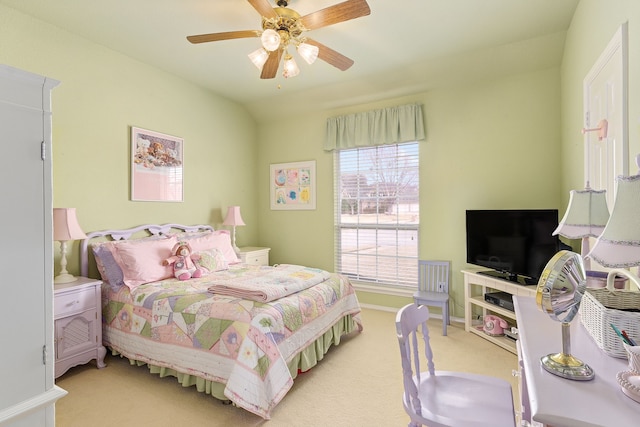 bedroom featuring ceiling fan, light colored carpet, vaulted ceiling, and multiple windows