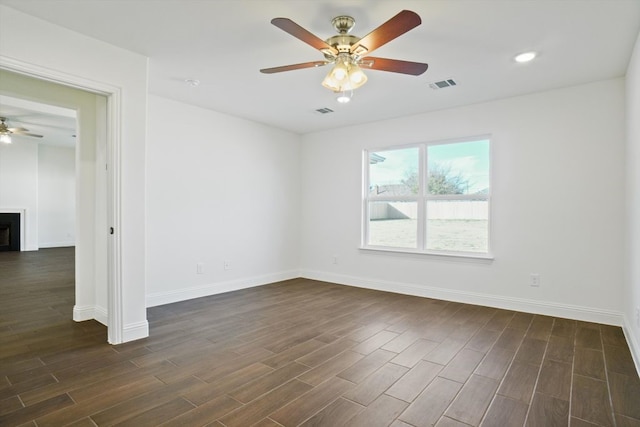 empty room featuring ceiling fan