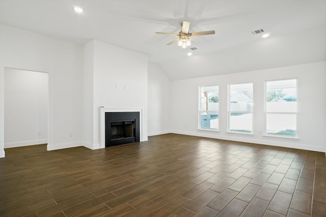 unfurnished living room featuring lofted ceiling and ceiling fan