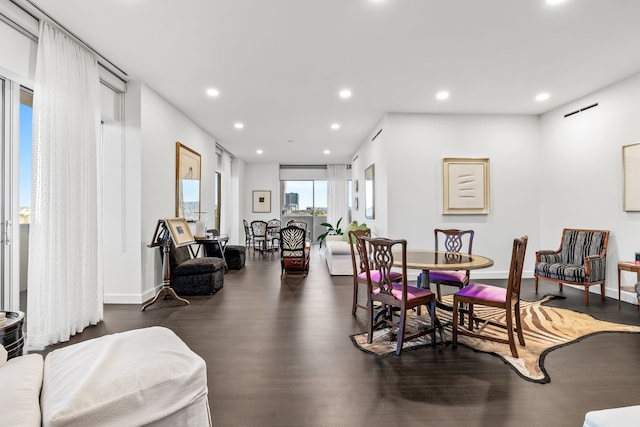 dining area with dark wood-type flooring