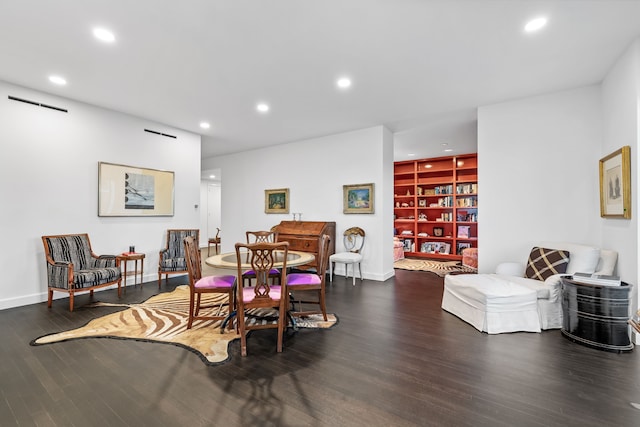 dining space with dark wood-type flooring