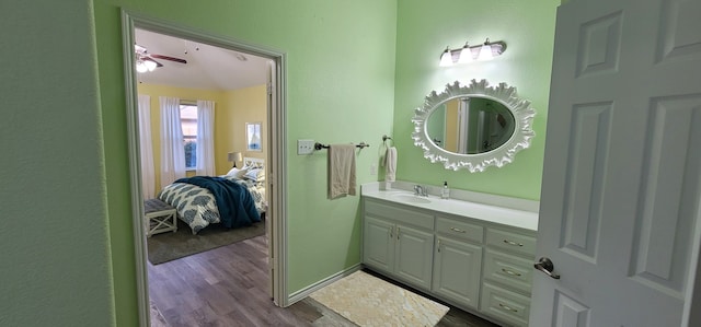 bathroom featuring vanity and hardwood / wood-style floors