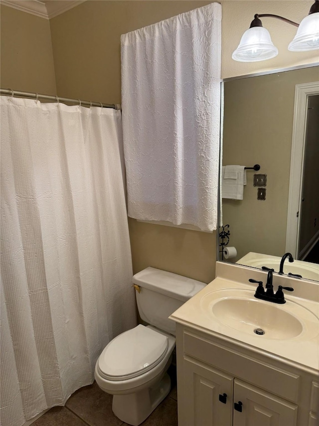 full bath featuring toilet, tile patterned flooring, ornamental molding, and vanity