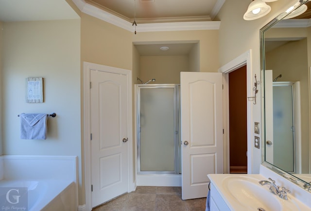 bathroom with a stall shower, crown molding, vanity, and a bath