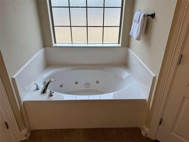 full bathroom with a whirlpool tub