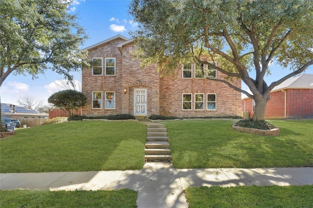 view of front facade with central AC and a front yard