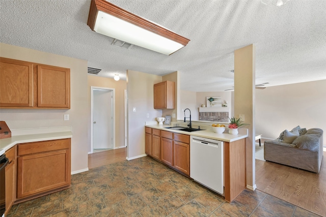 kitchen with ceiling fan, dishwasher, and sink